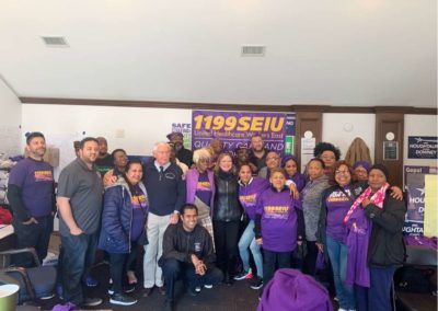 A group photo with Vin Gopal at a 1199 SEIU United Healthcare Workers Event.