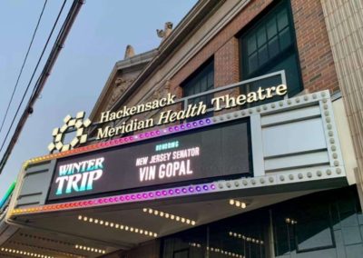 A theater marquee with Senator Vin Gopal's name