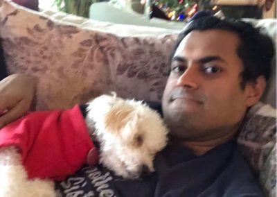 Vin Gopal with his dog at Christmas time.